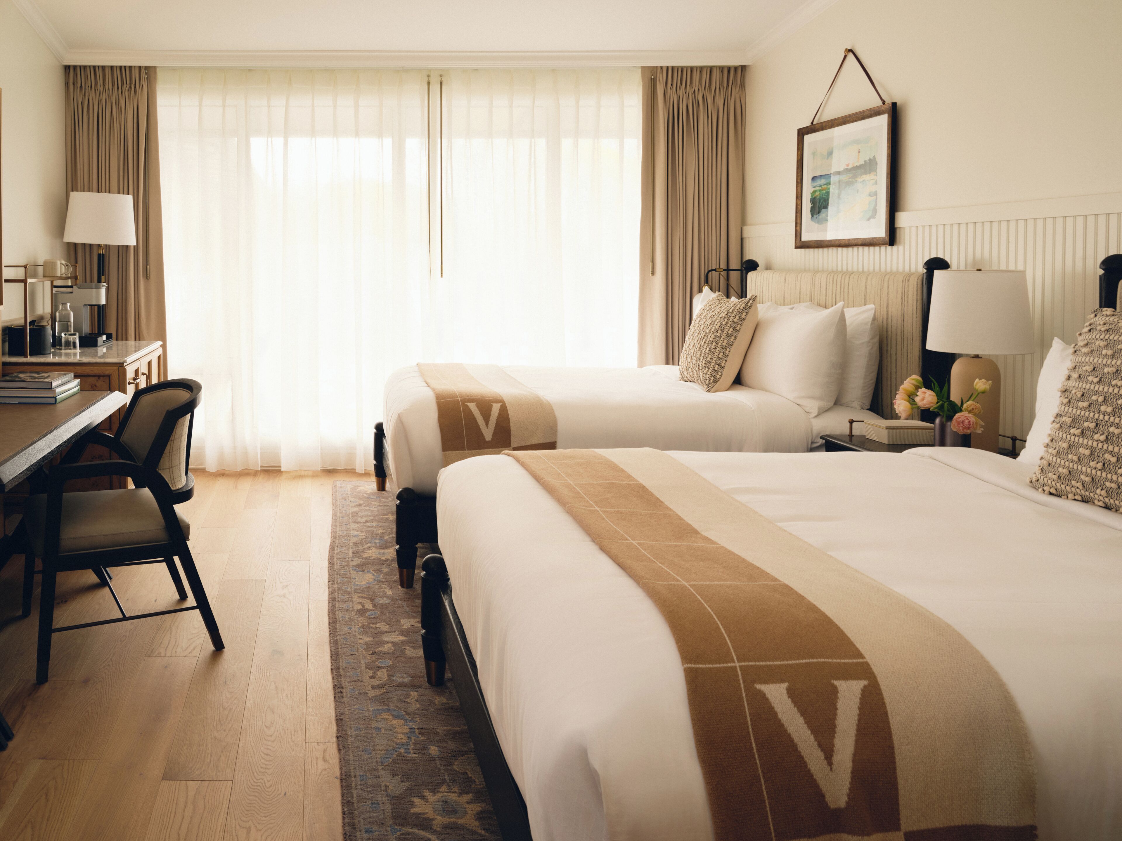 Premium bedding, down comforters, pillowtop beds, in-room safe