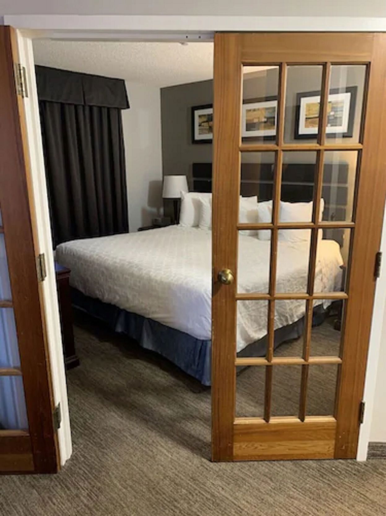 Desk, blackout drapes, iron/ironing board, free cribs/infant beds