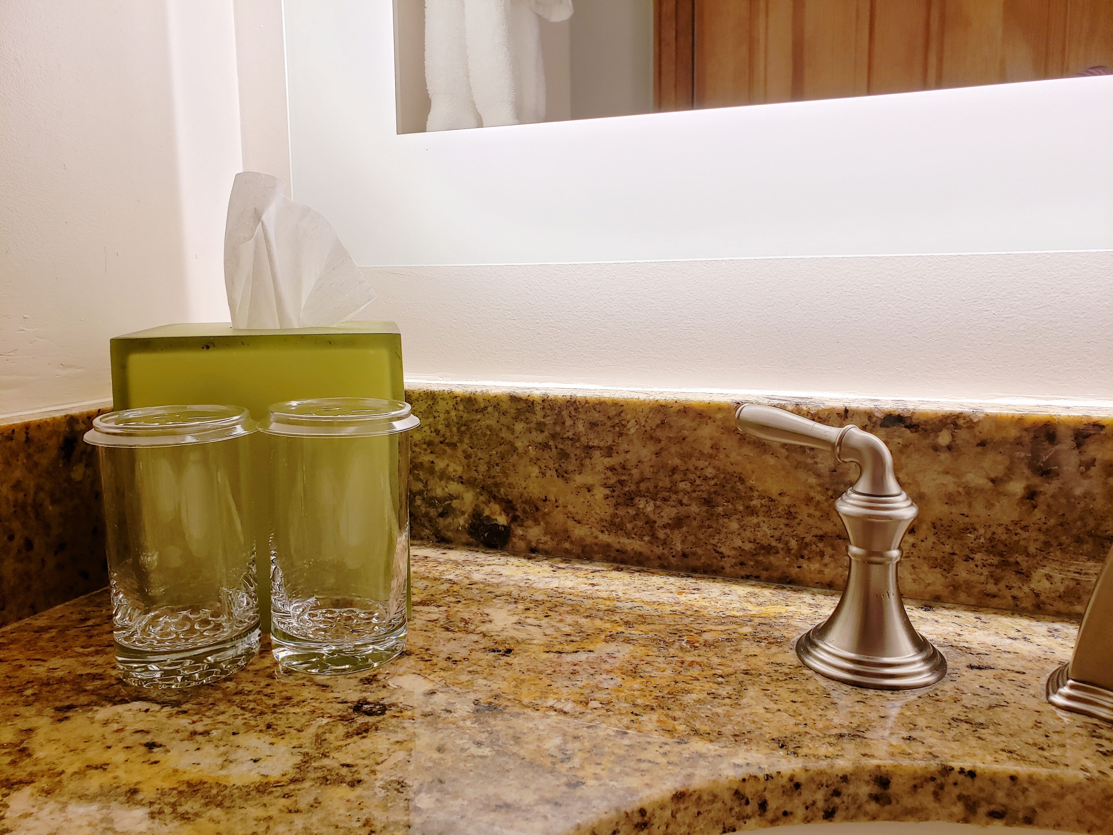 combined shower/bathtub, designer toiletries, hair dryer, bathrobes