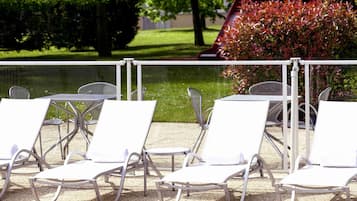Seasonal outdoor pool, pool umbrellas, sun loungers