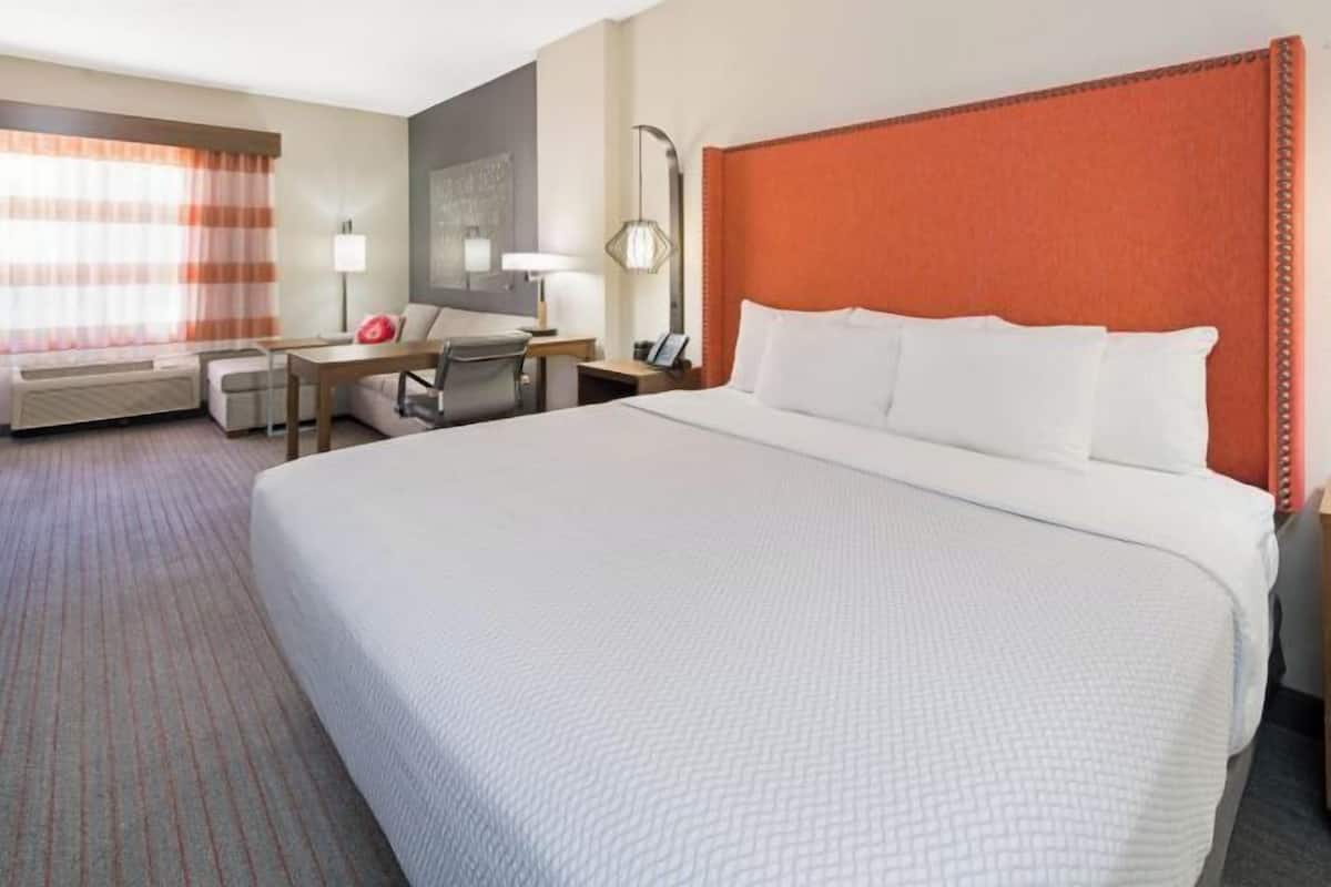 Premium bedding, desk, blackout curtains, iron/ironing board