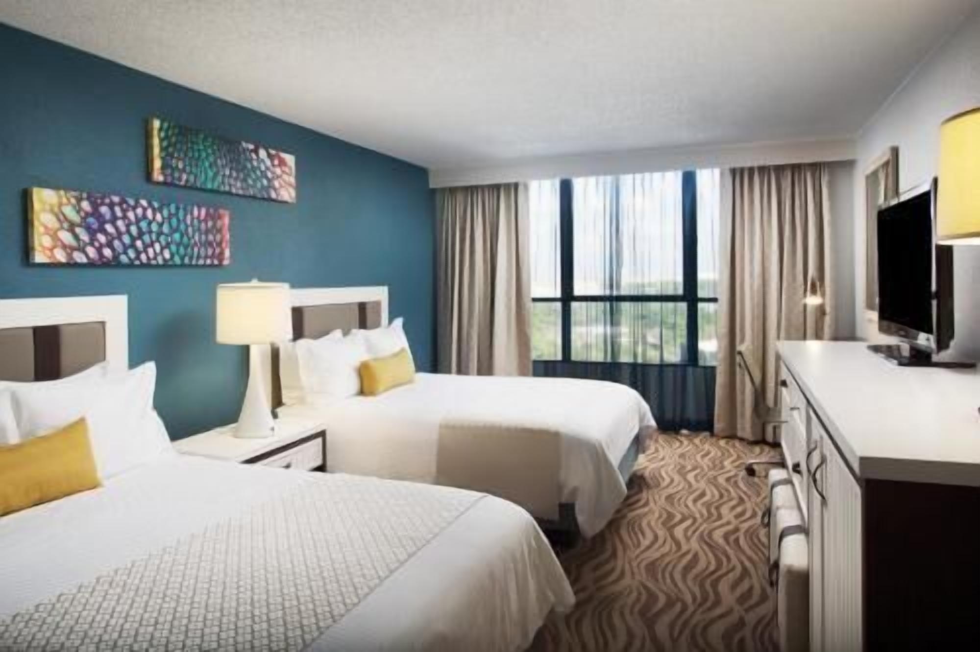 Premium bedding, pillow-top beds, in-room safe, desk