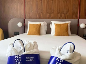 Hypo-allergenic bedding, down duvets, Select Comfort beds, minibar