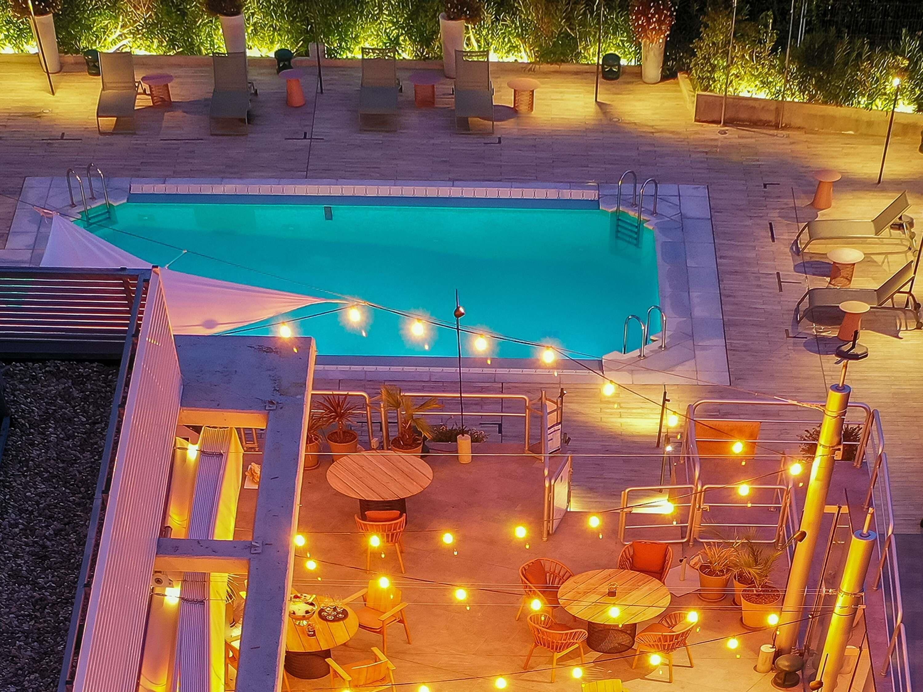 Outdoor pool, open 10:00 AM to 8:00 PM, pool umbrellas, sun loungers