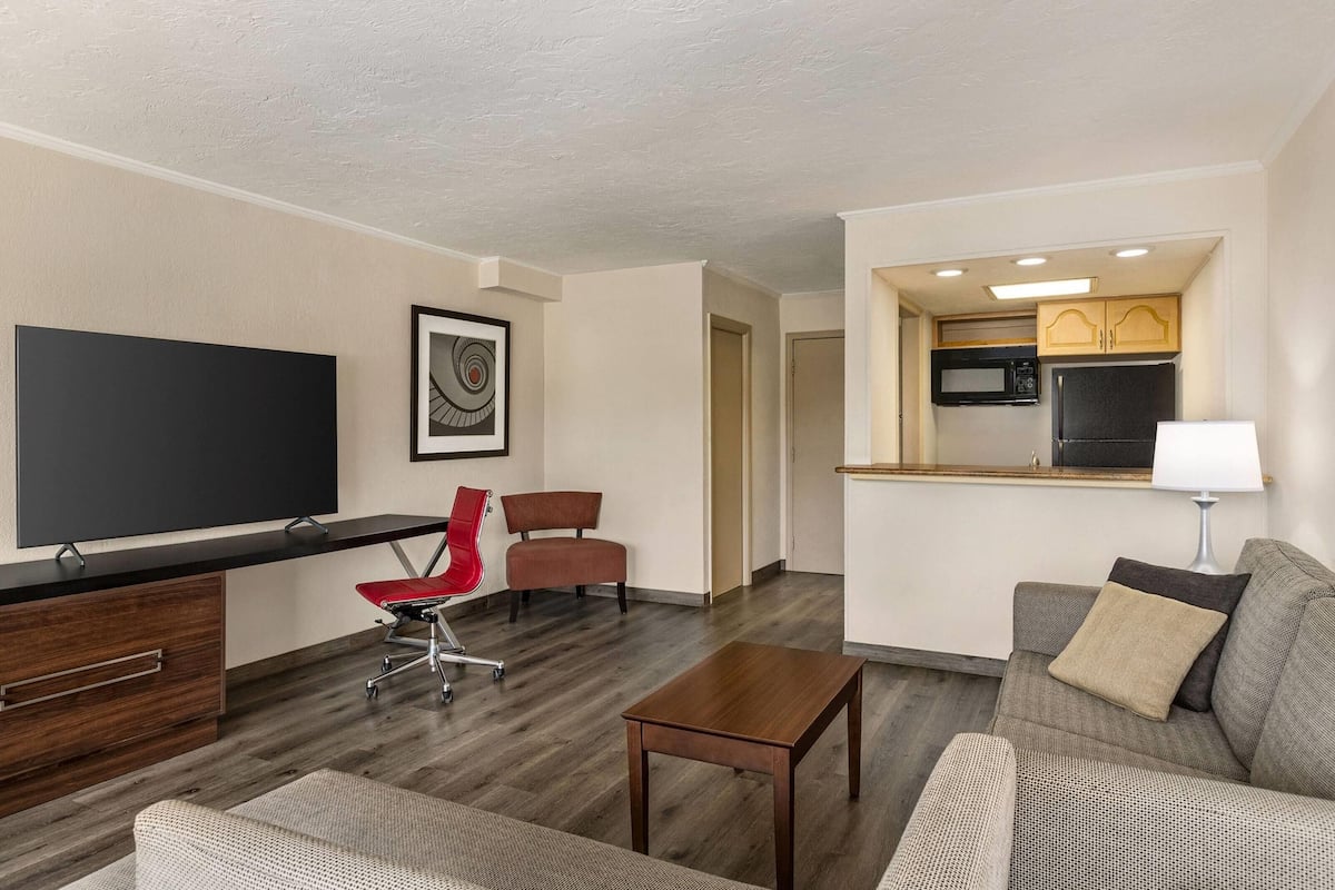 hypo-allergenic bedding, desk, blackout curtains, iron/ironing board