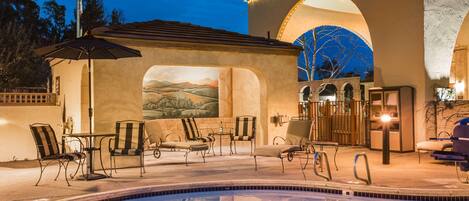 Outdoor pool, open 7:00 AM to 10:00 PM, pool loungers