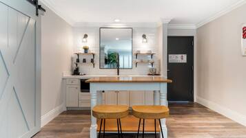 Suite, 1 King Bed, Non Smoking, Fireplace (with Sofabed) | Living area | 55-inch flat-screen TV with satellite channels, TV