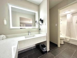 2 Double Beds, Suite, Non-Smoking | Bathroom | Combined shower/tub, free toiletries, hair dryer, towels