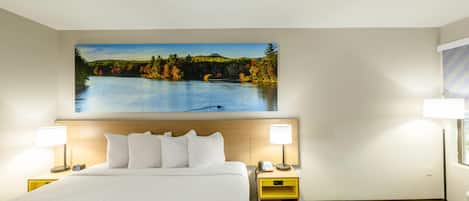 Desk, laptop workspace, blackout drapes, iron/ironing board