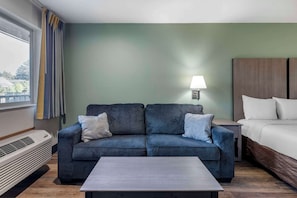 Suite, 1 King Bed, Non Smoking | Pillow-top beds, in-room safe, desk, blackout curtains