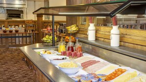 A buffet with various food items and beverages. - Holiday Inn Colchester by IHG (Colchester)