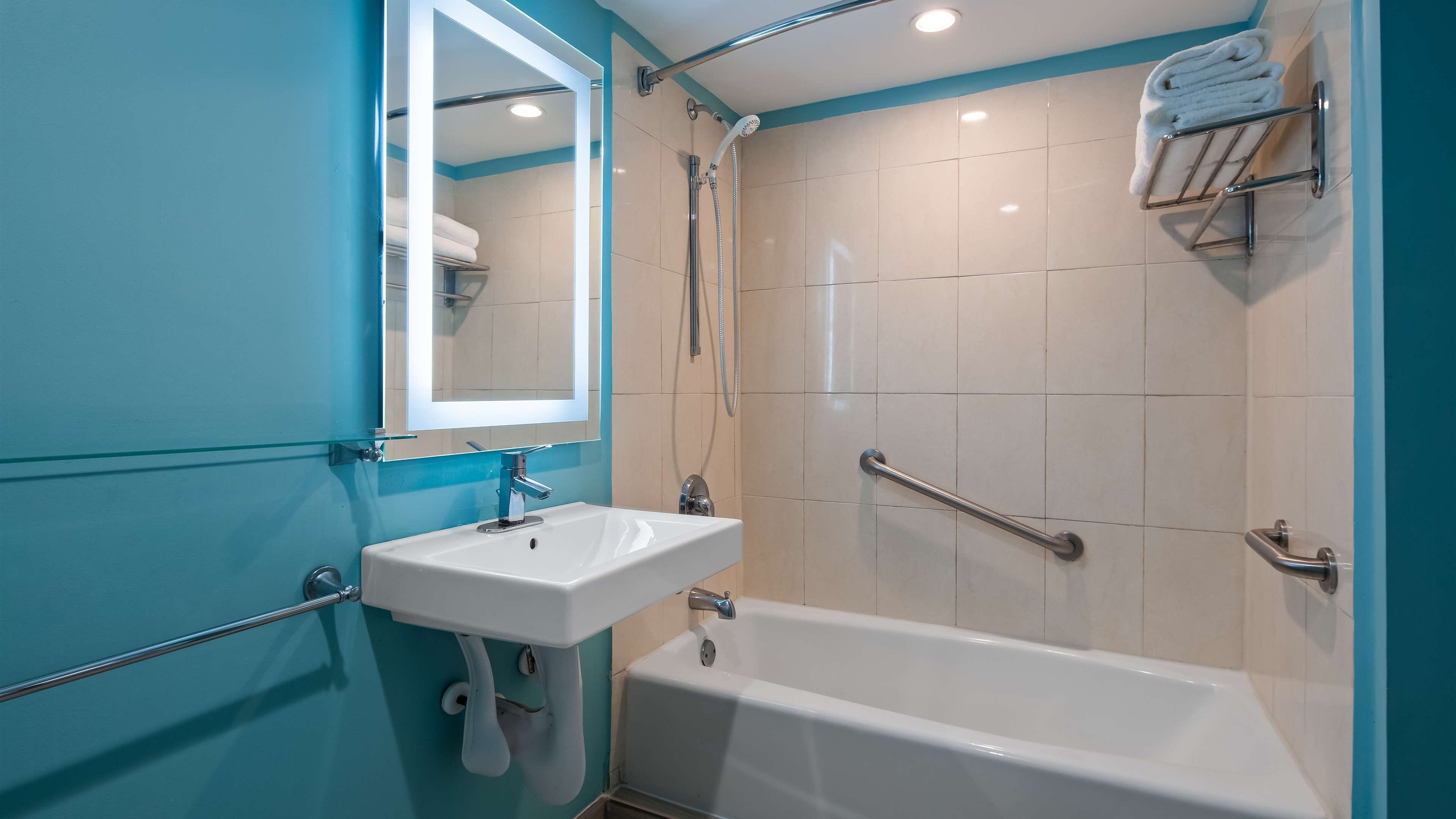 standard room, 2 queen beds, accessible, bathtub | bathroom | eco-friendly toiletries, hair dryer, towels, soap