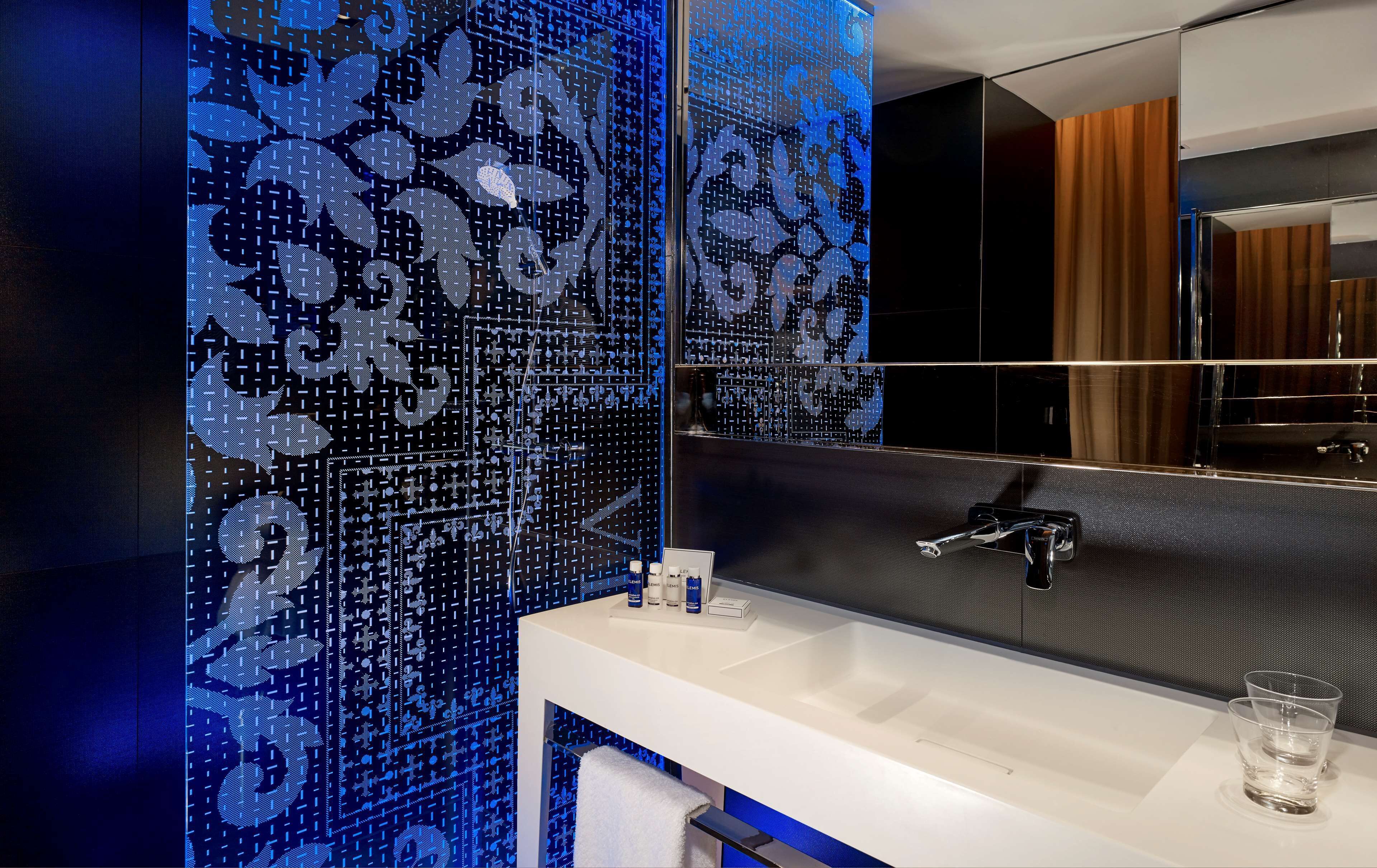 combined shower/bathtub, rainfall showerhead, designer toiletries