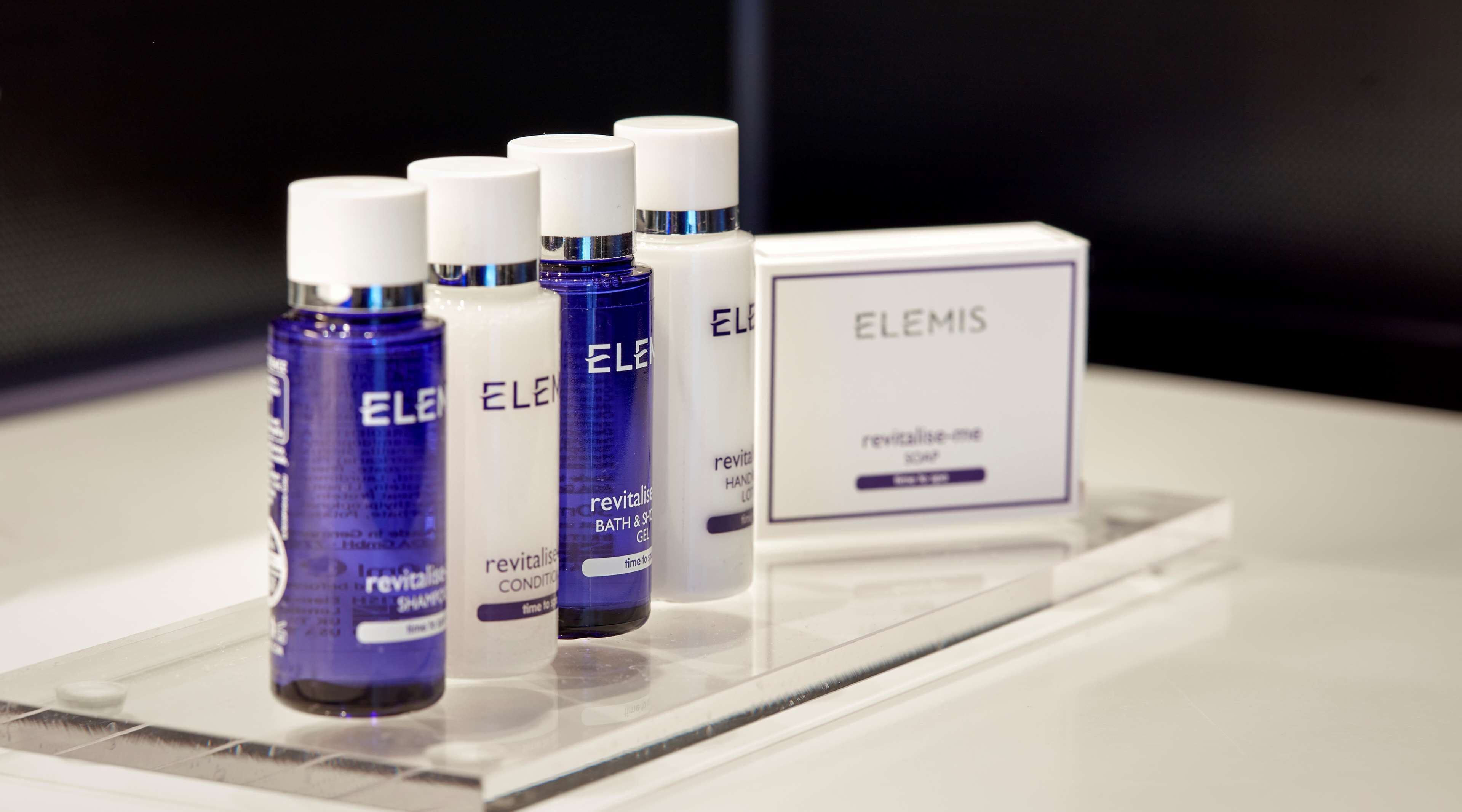 combined shower/bathtub, rainfall showerhead, designer toiletries