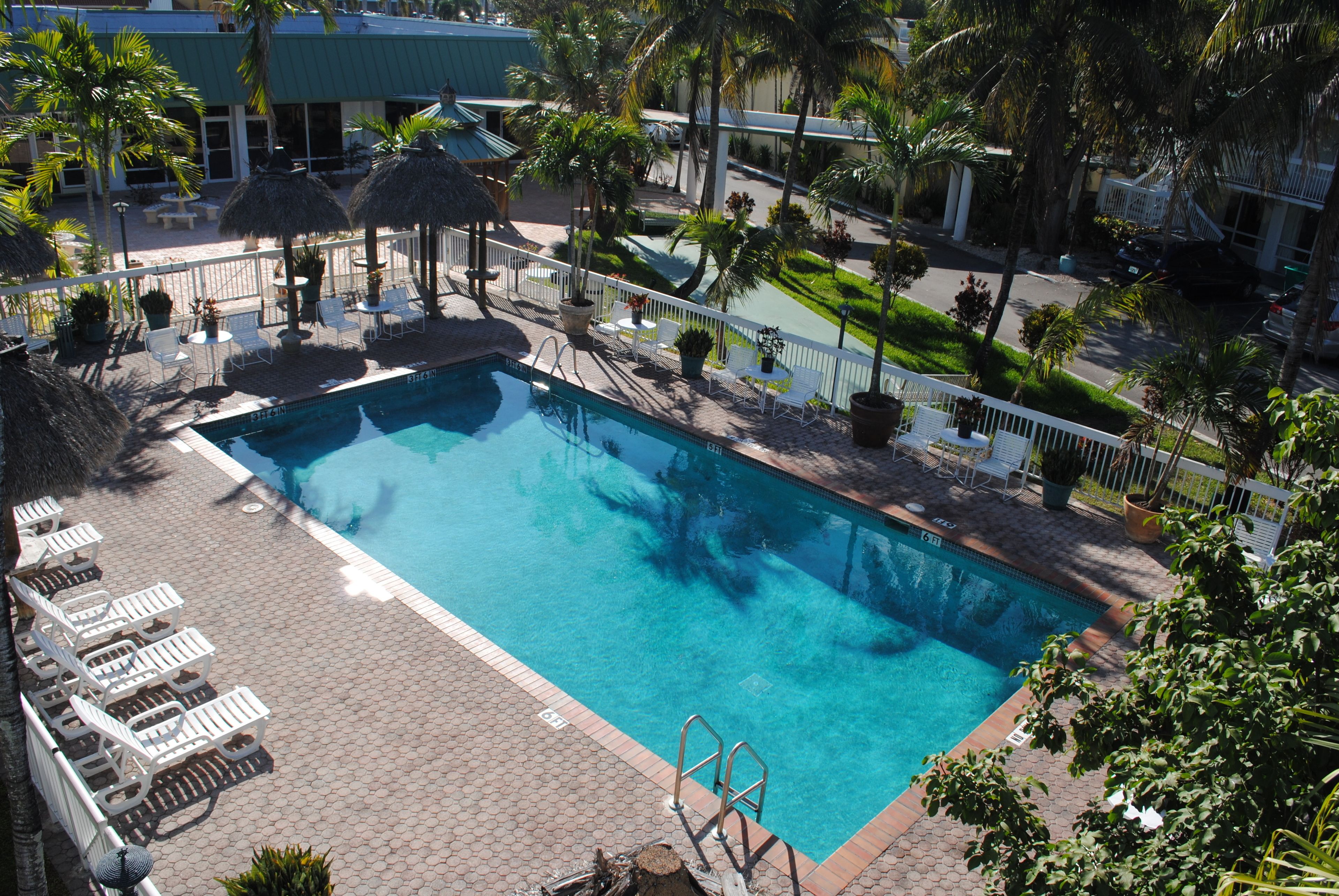 Outdoor pool, open 8:00 AM to 9:00 PM, free cabanas, pool umbrellas