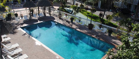 Outdoor pool, open 8:00 AM to 9:00 PM, free cabanas, pool umbrellas