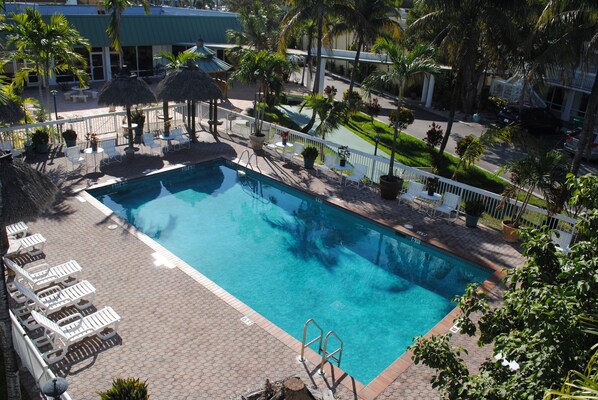 Outdoor pool, open 8:00 AM to 9:00 PM, free pool cabanas, pool umbrellas