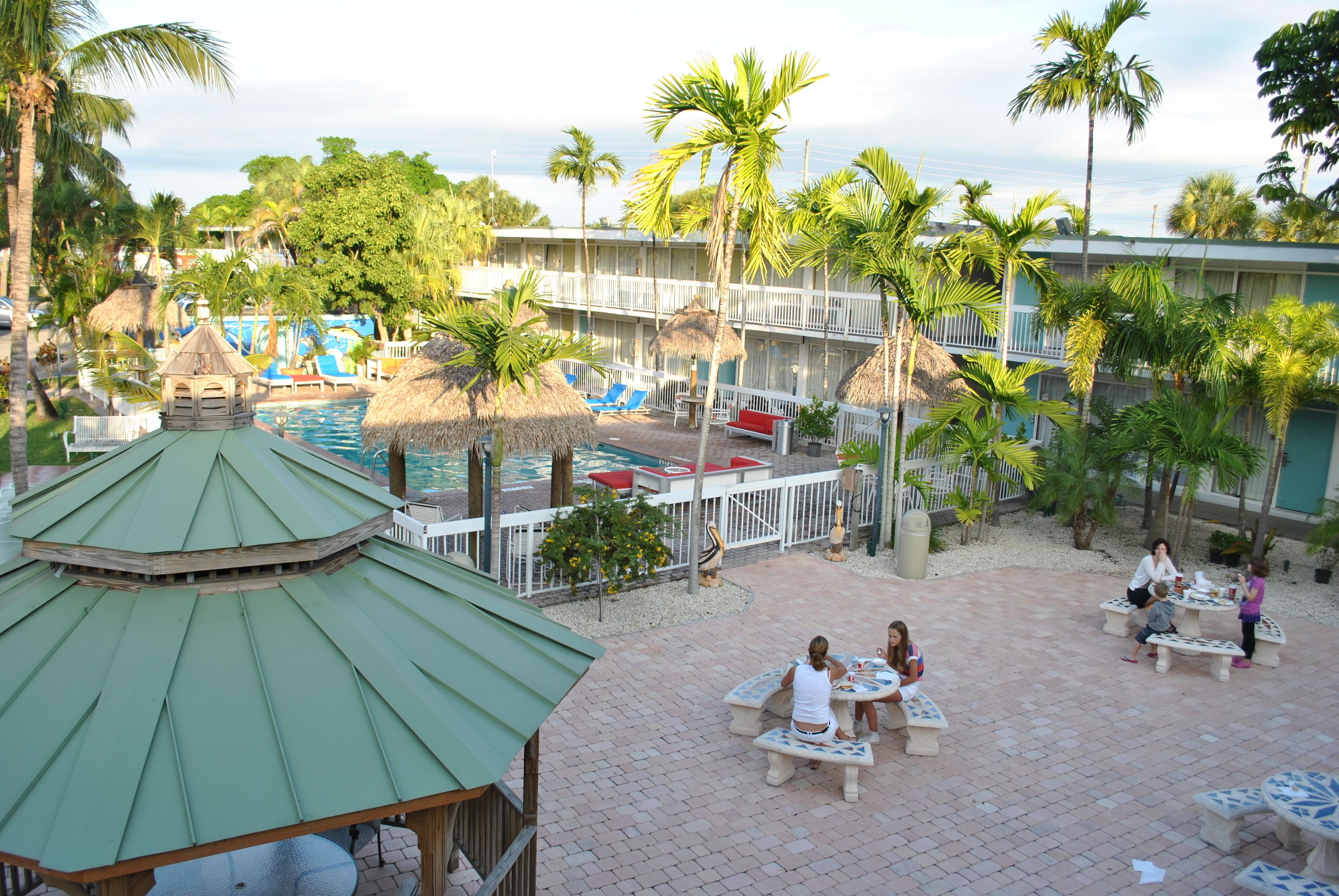 Outdoor pool, open 8:00 AM to 9:00 PM, free cabanas, pool umbrellas