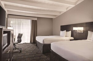 Premium bedding, pillowtop beds, desk, laptop workspace