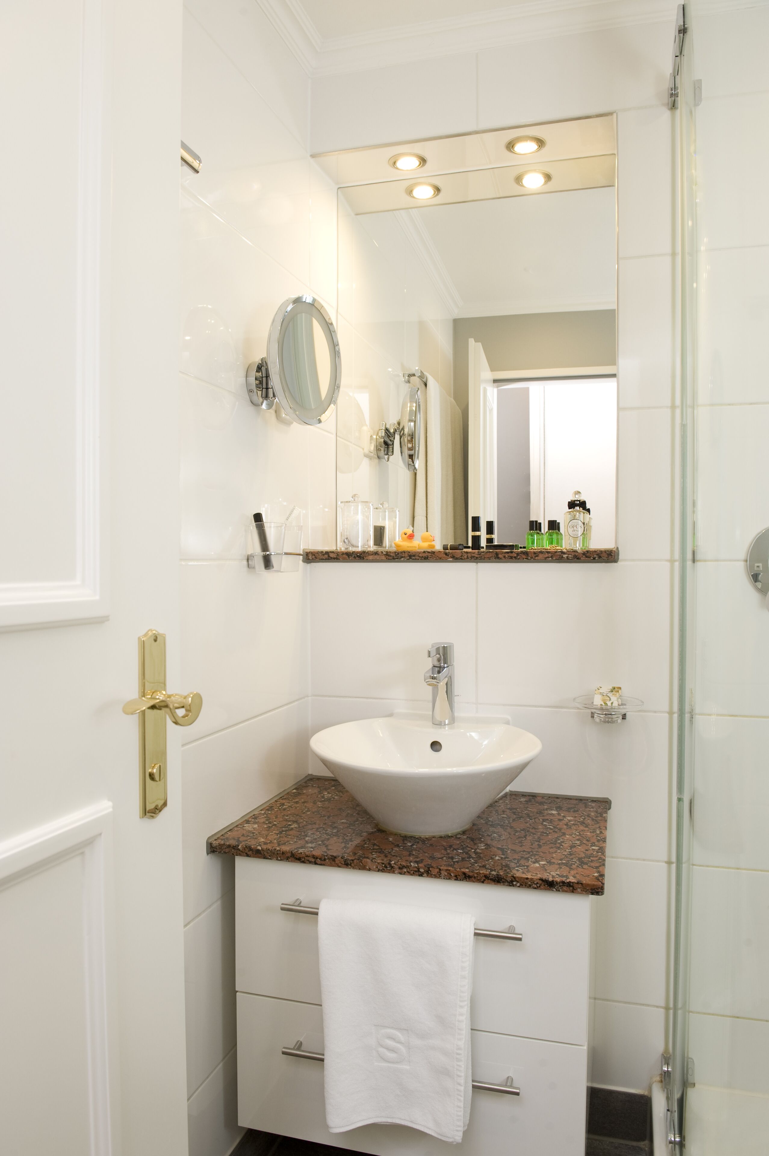 eco-friendly toiletries, hair dryer, towels