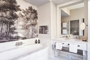 Separate bathtub and shower, rainfall showerhead, designer toiletries