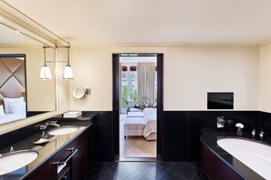 Separate bathtub and shower, rainfall showerhead, designer toiletries