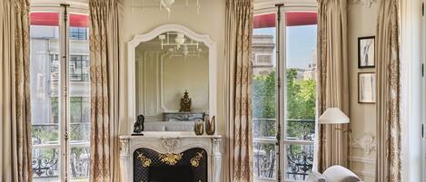 Signature Suite (Arc de Triomphe) | Living area | 82-cm Smart TV with satellite channels, pay movies, offices