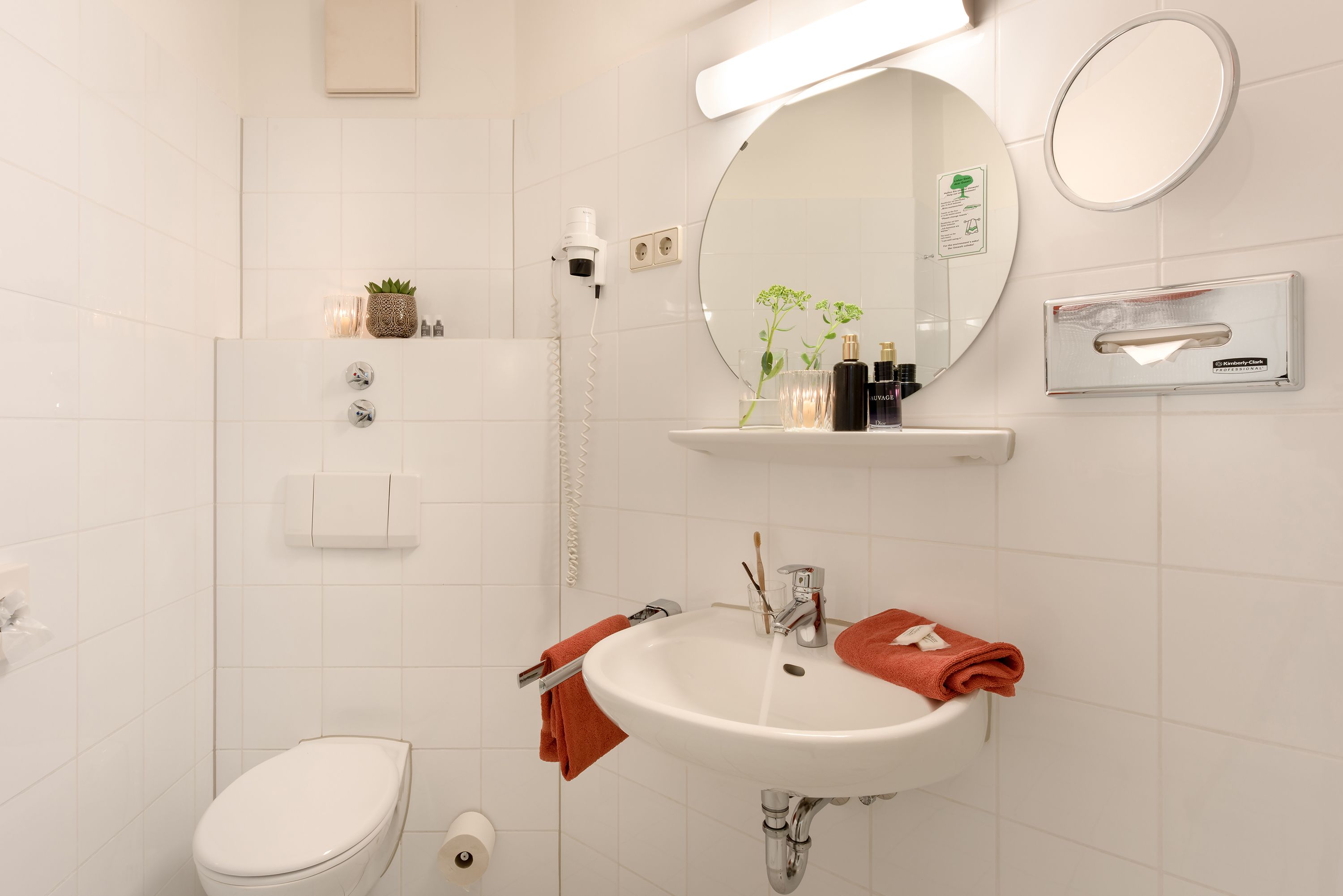 family room | bathroom | shower, hair dryer, towels