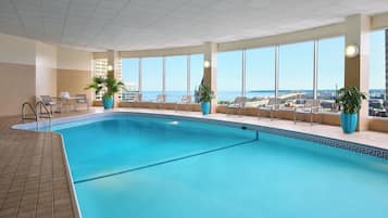 Indoor pool, open 6:00 AM to 10 PM, pool loungers