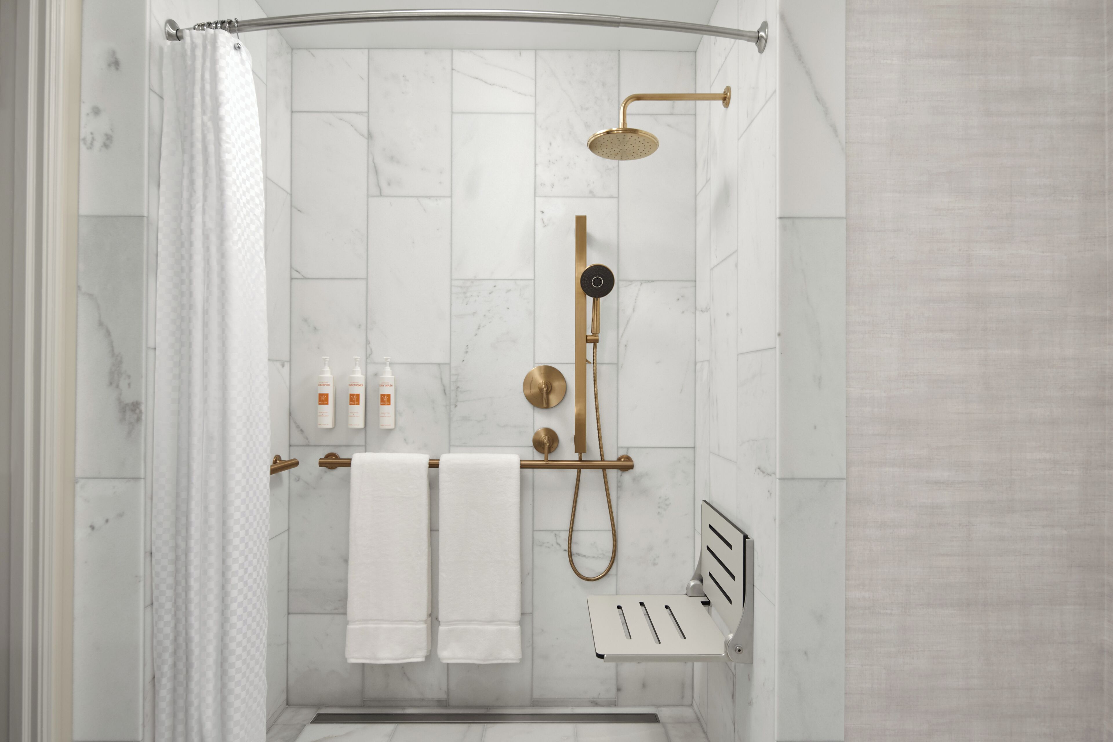 combined shower/bathtub, designer toiletries, hair dryer, slippers