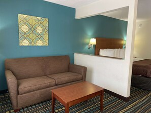 Roupas de cama premium, escrivaninha, espaço de trabalho para notebook