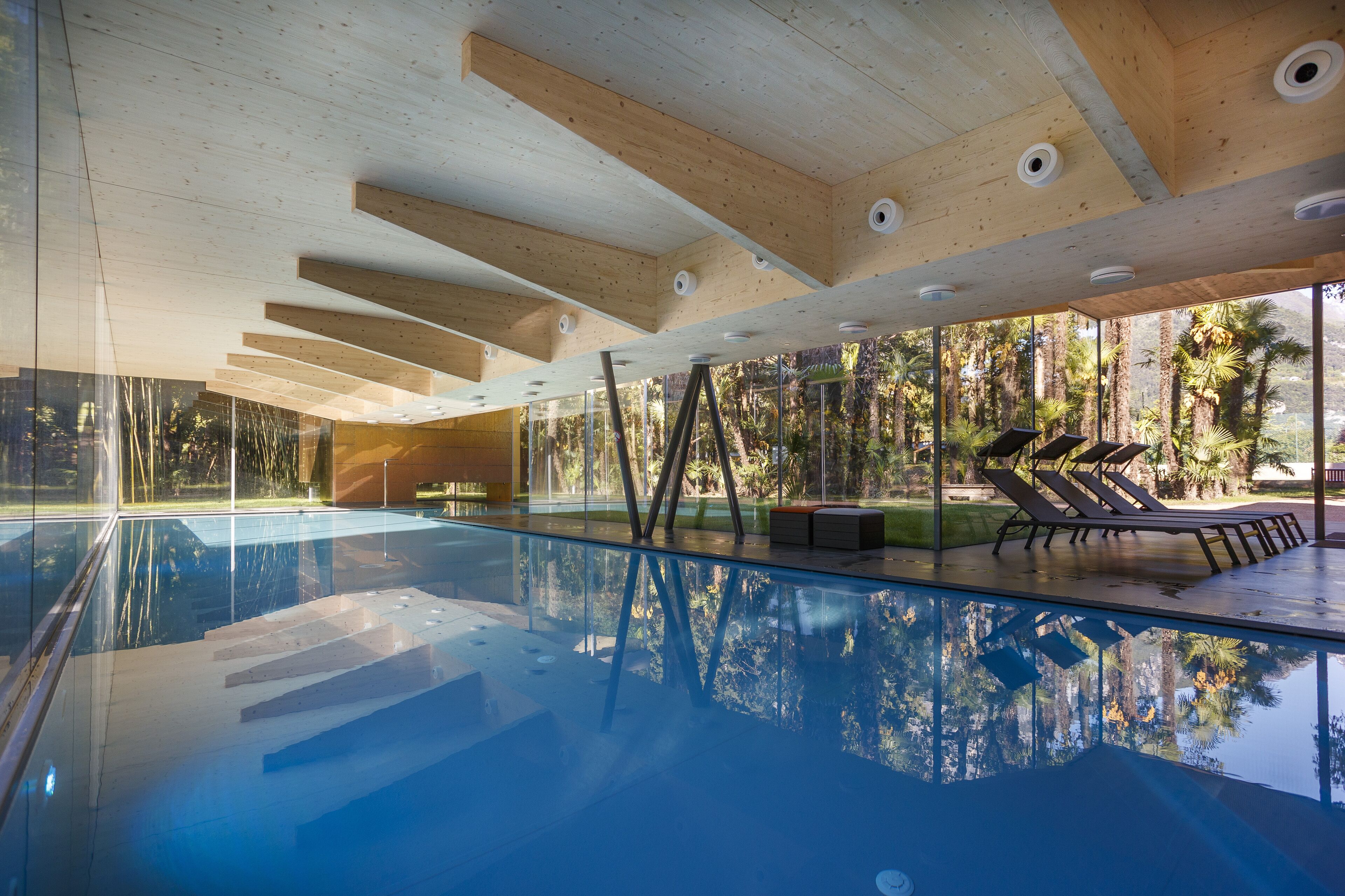 indoor pool, outdoor pool, pool loungers