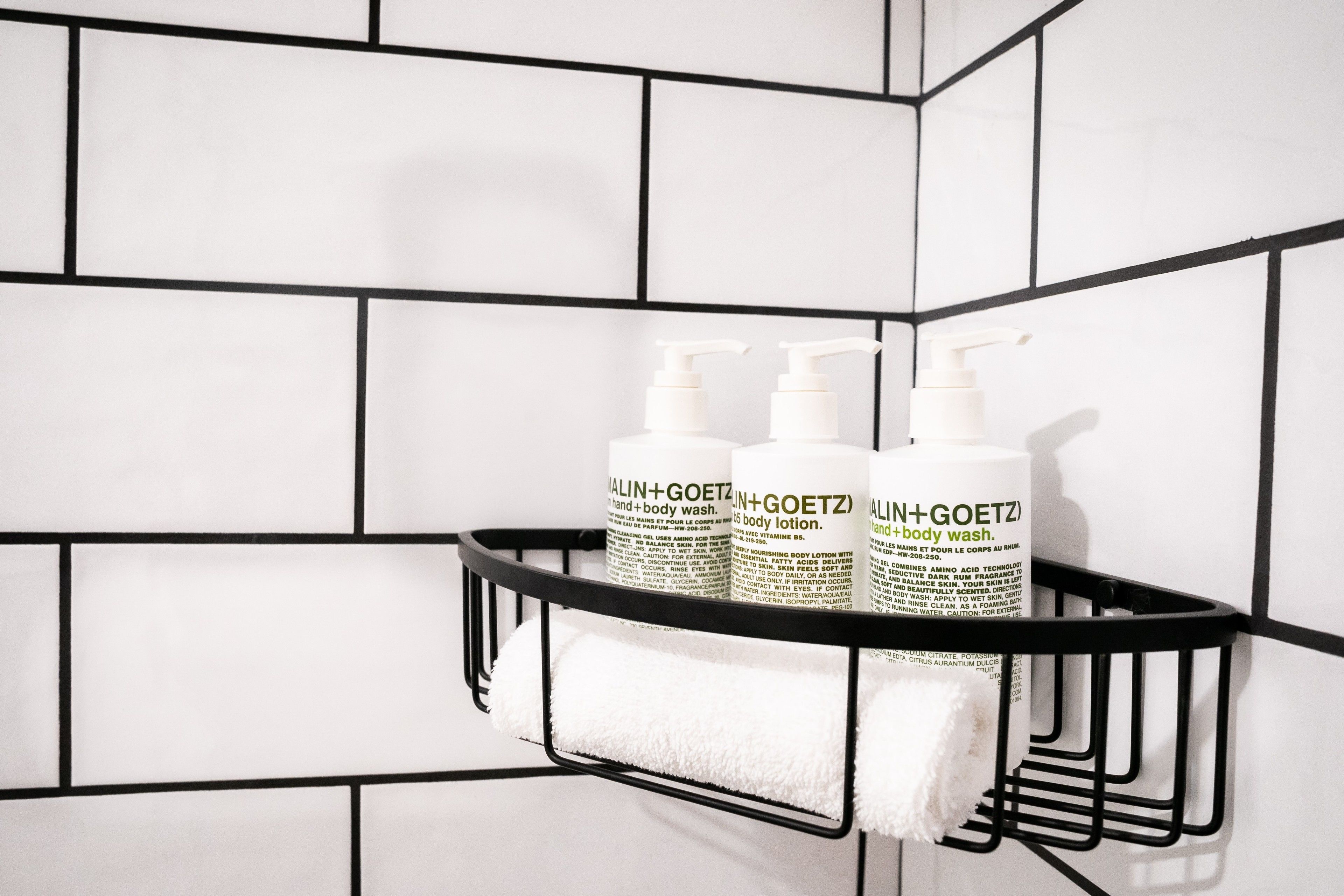 combined shower/bathtub, rainfall showerhead, hair dryer, bathrobes