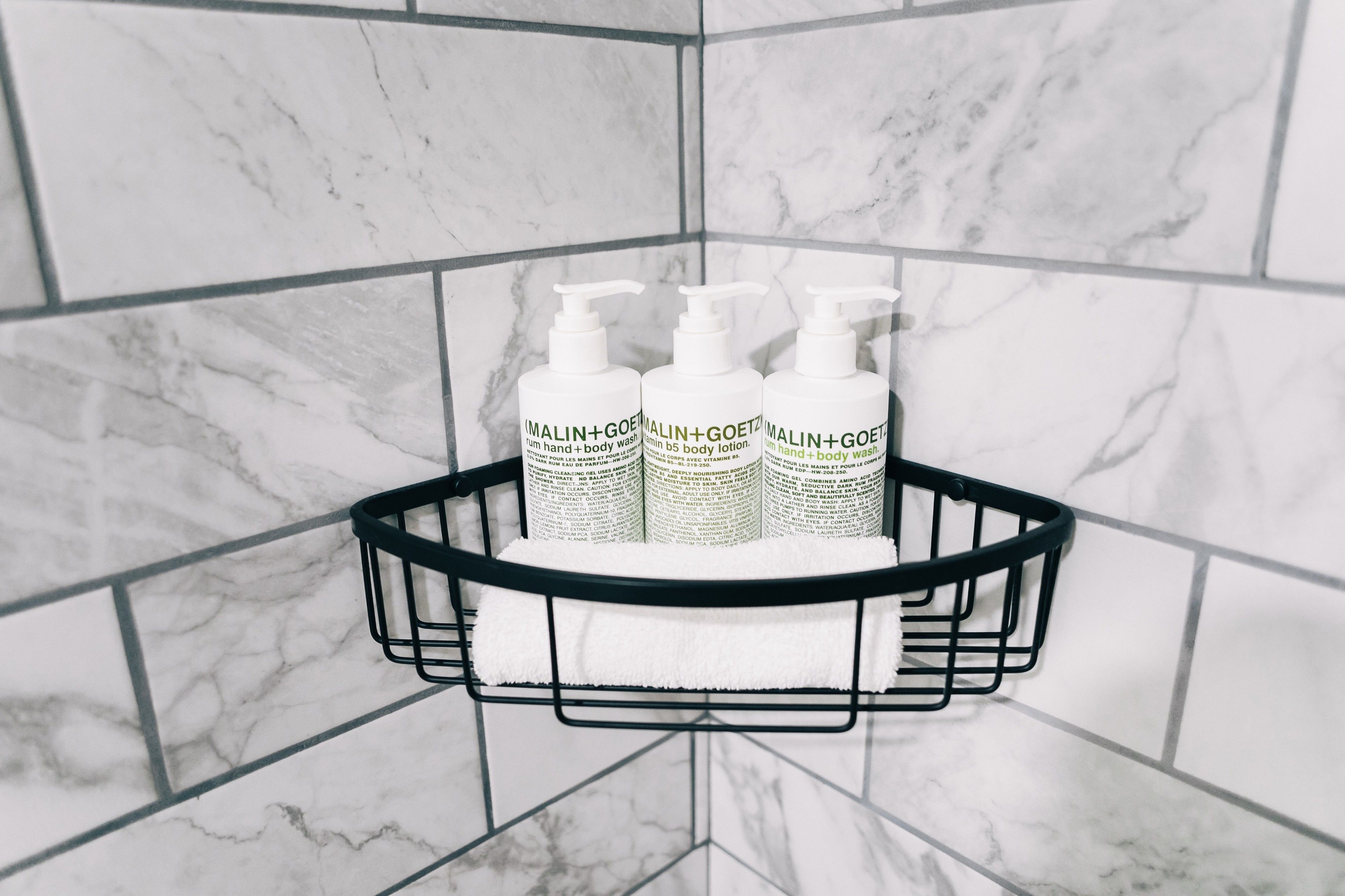 combined shower/bathtub, rainfall showerhead, hair dryer, bathrobes