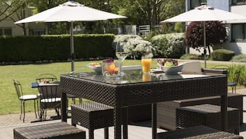 Breakfast, lunch served; international cuisine, al fresco dining 