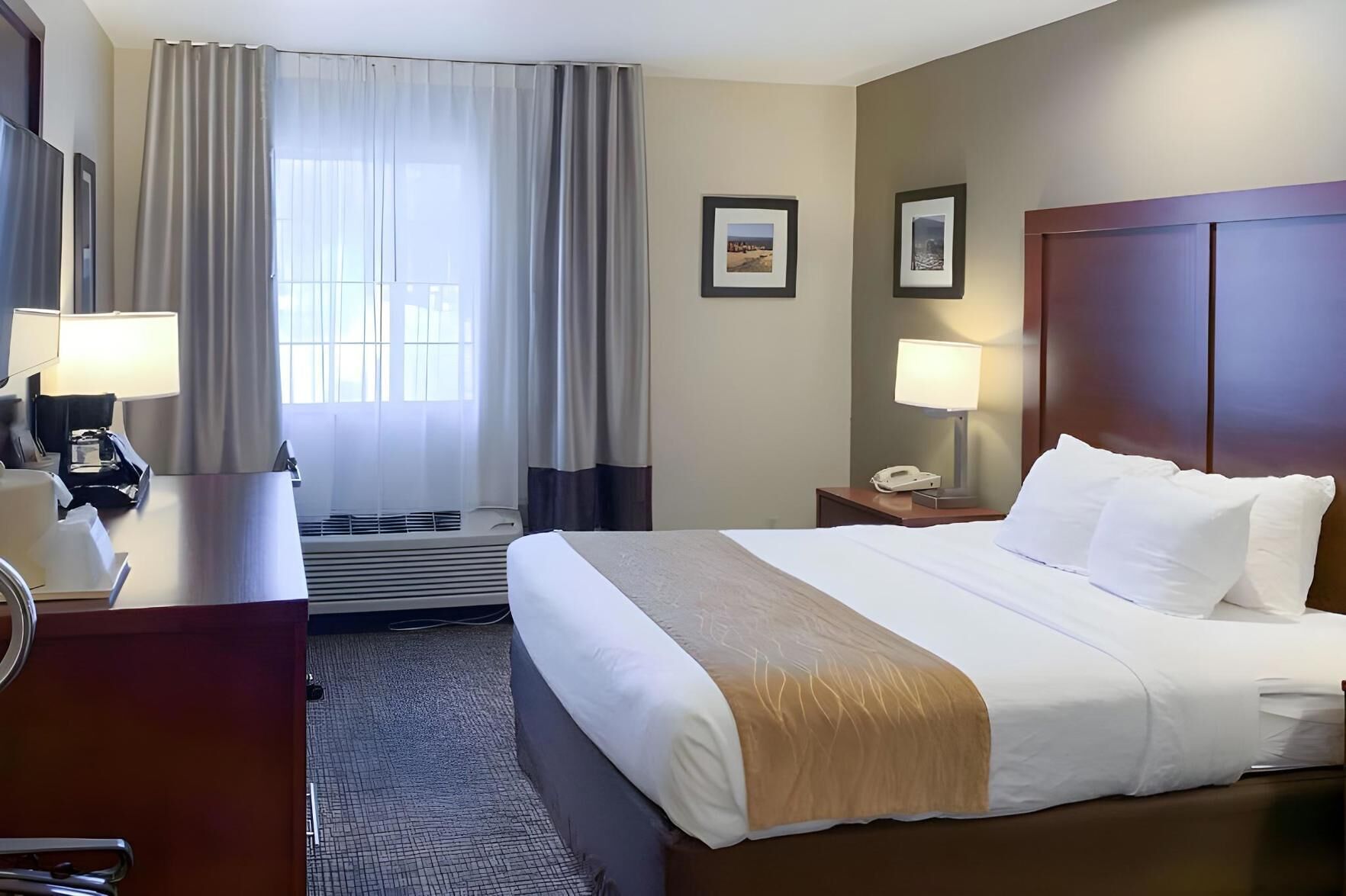 Premium bedding, desk, blackout drapes, iron/ironing board