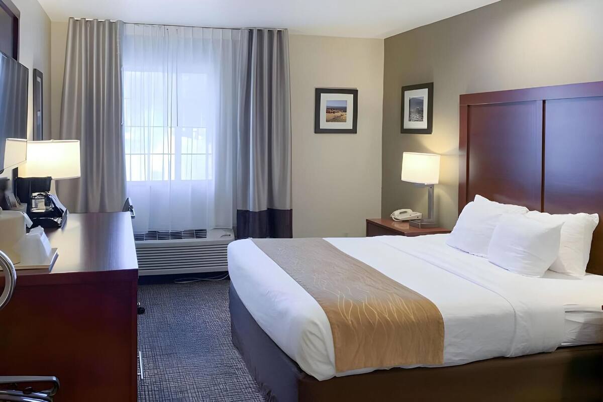 Premium bedding, desk, blackout drapes, iron/ironing board