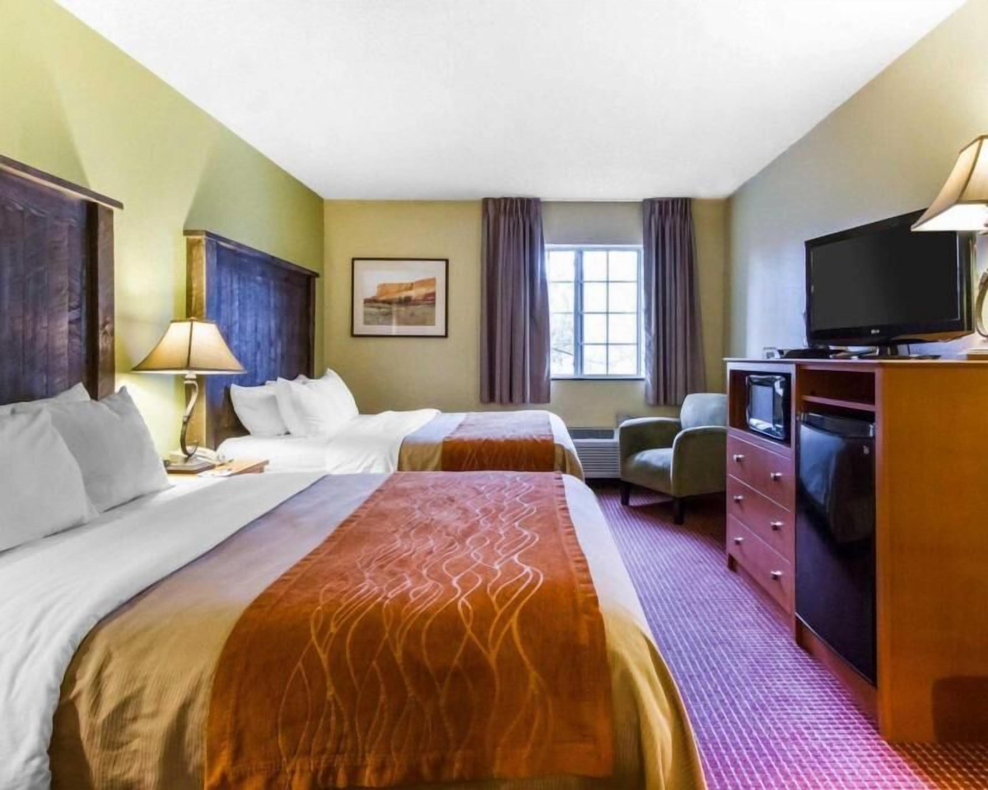 Premium bedding, desk, blackout drapes, iron/ironing board