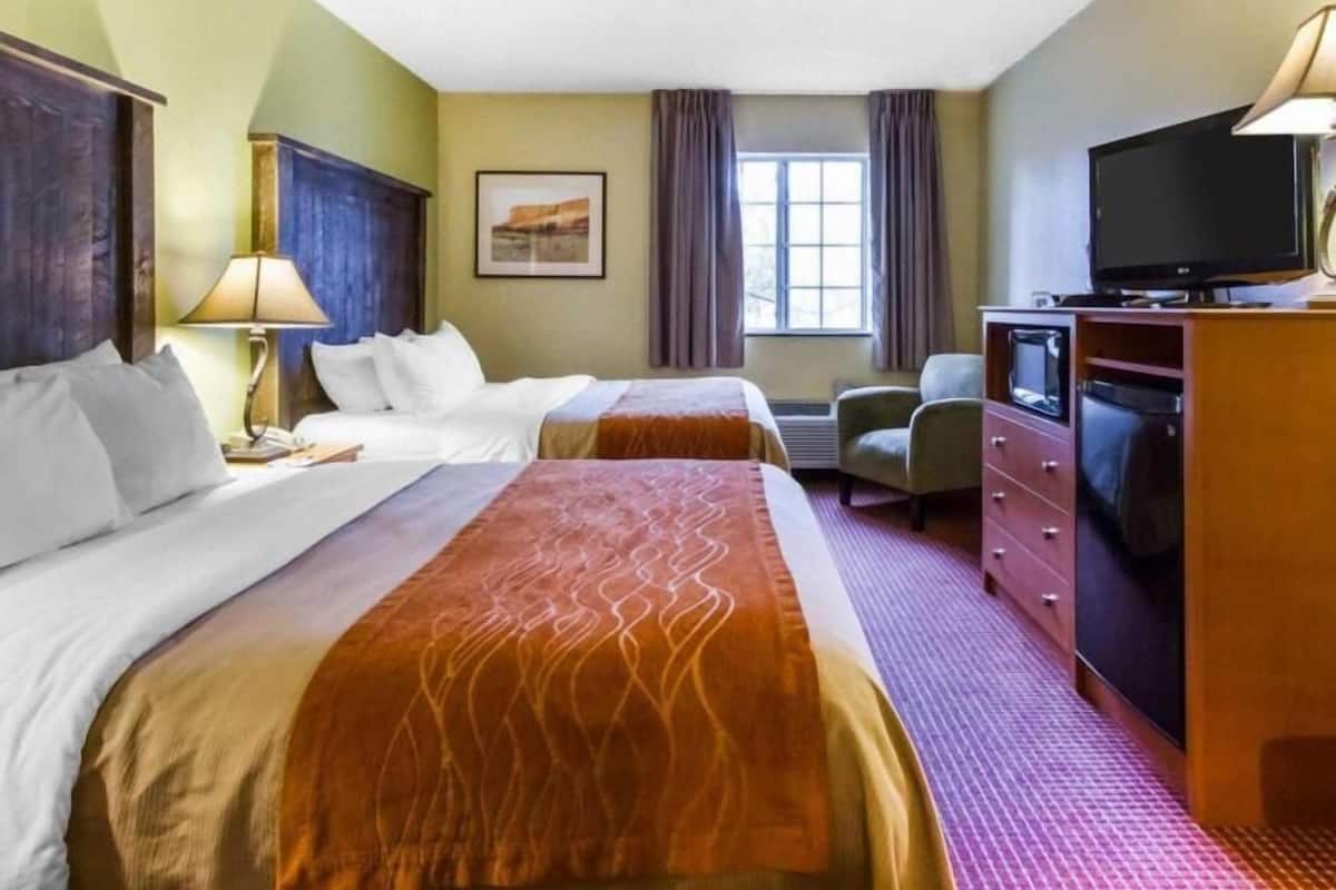 Premium bedding, desk, blackout drapes, iron/ironing board