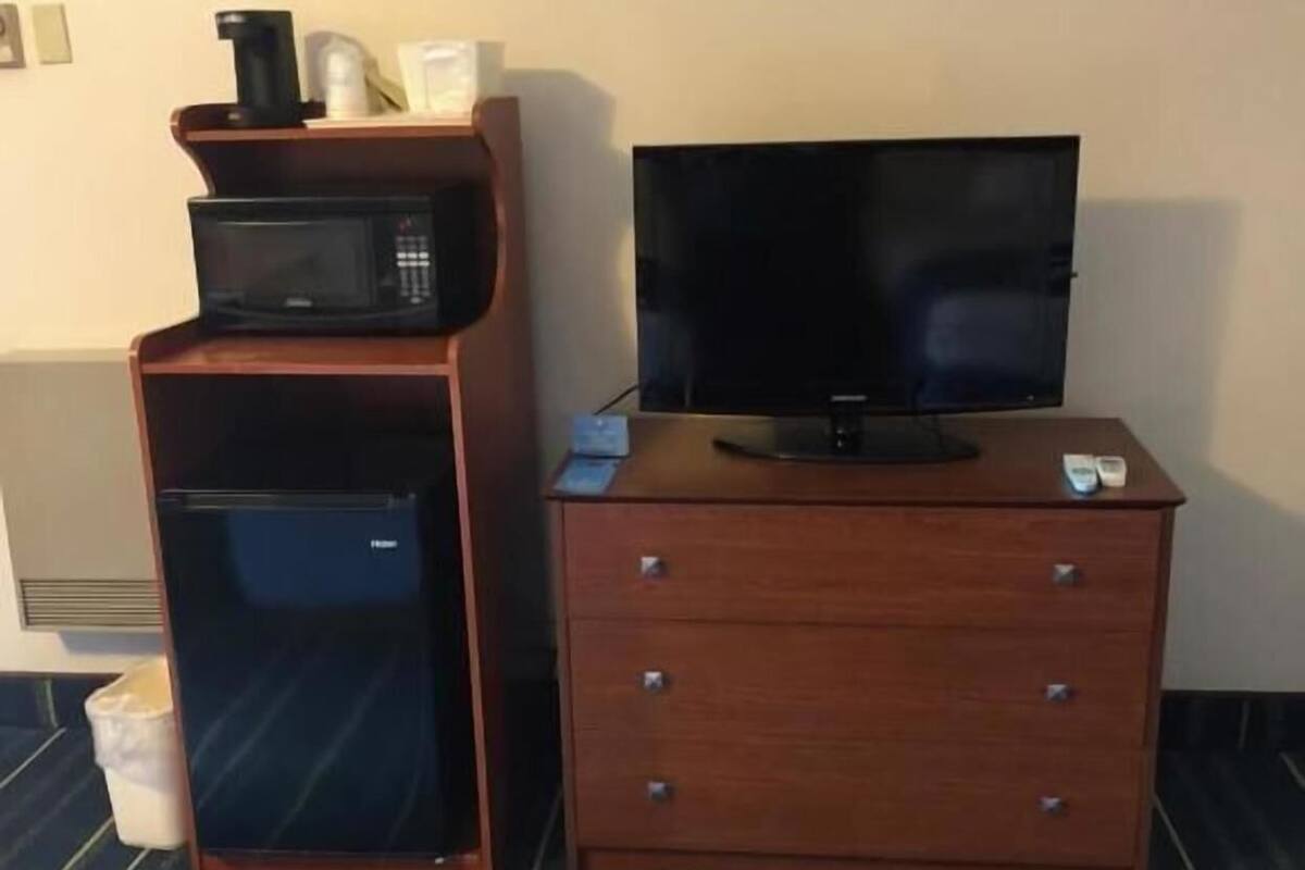 Tabla de planchar con plancha, camas extra, wifi gratis y ropa de cama
