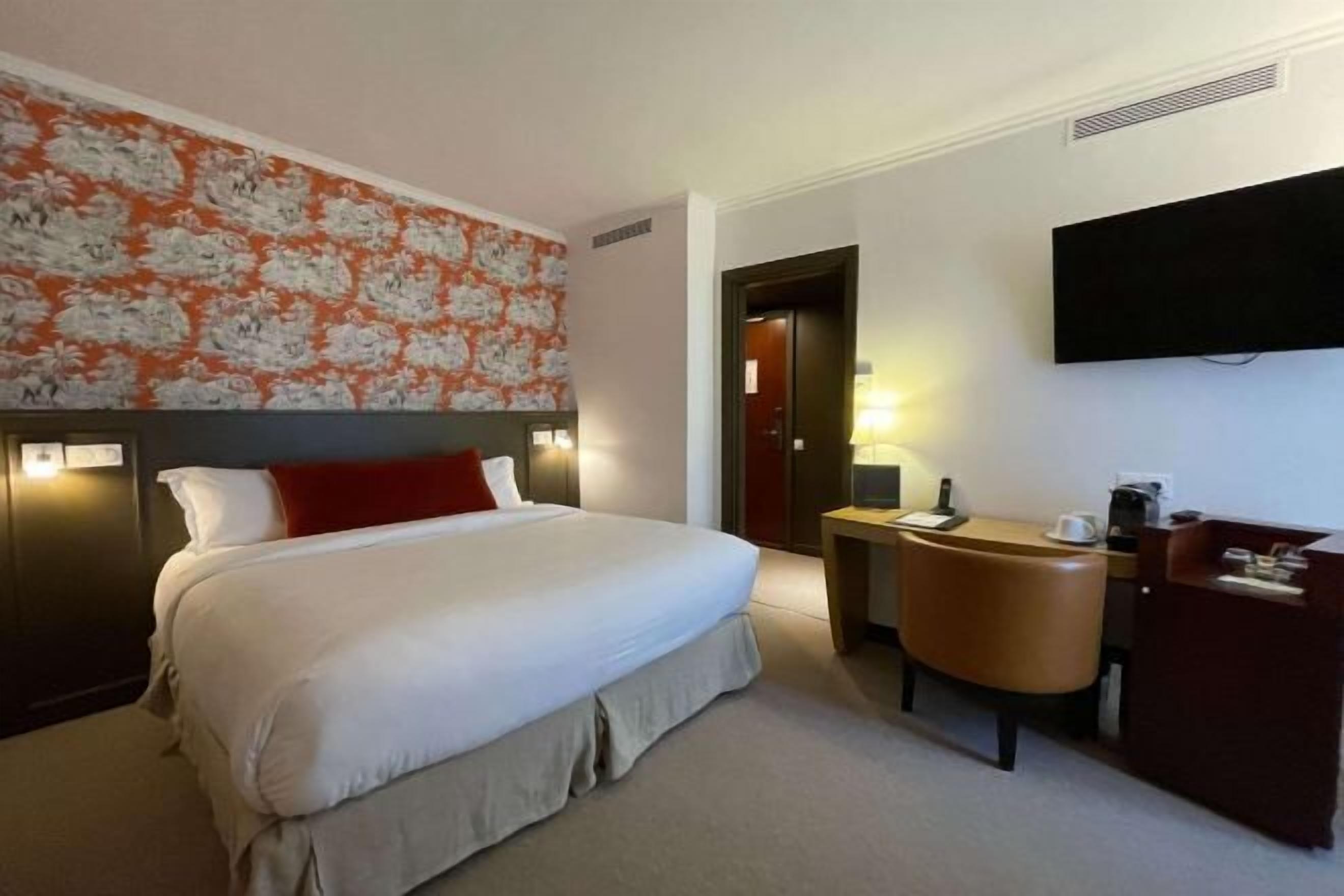 Premium bedding, memory foam beds, in-room safe, desk