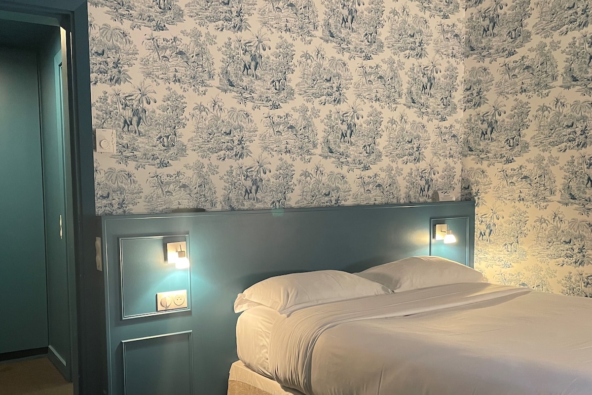 Premium bedding, memory-foam beds, in-room safe, desk