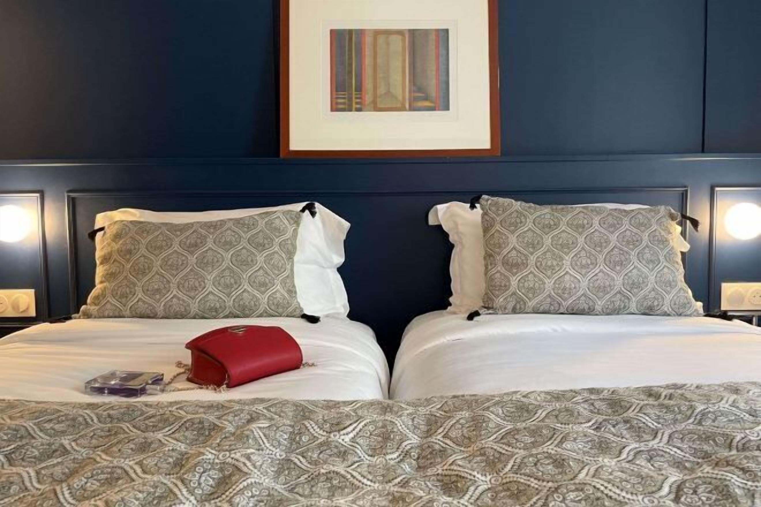 Premium bedding, memory foam beds, in-room safe, desk