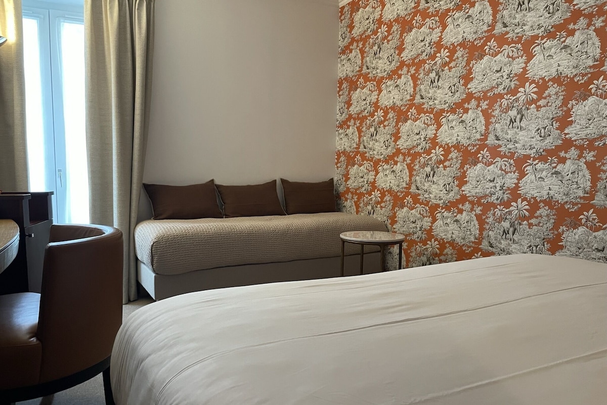Premium bedding, memory-foam beds, in-room safe, desk