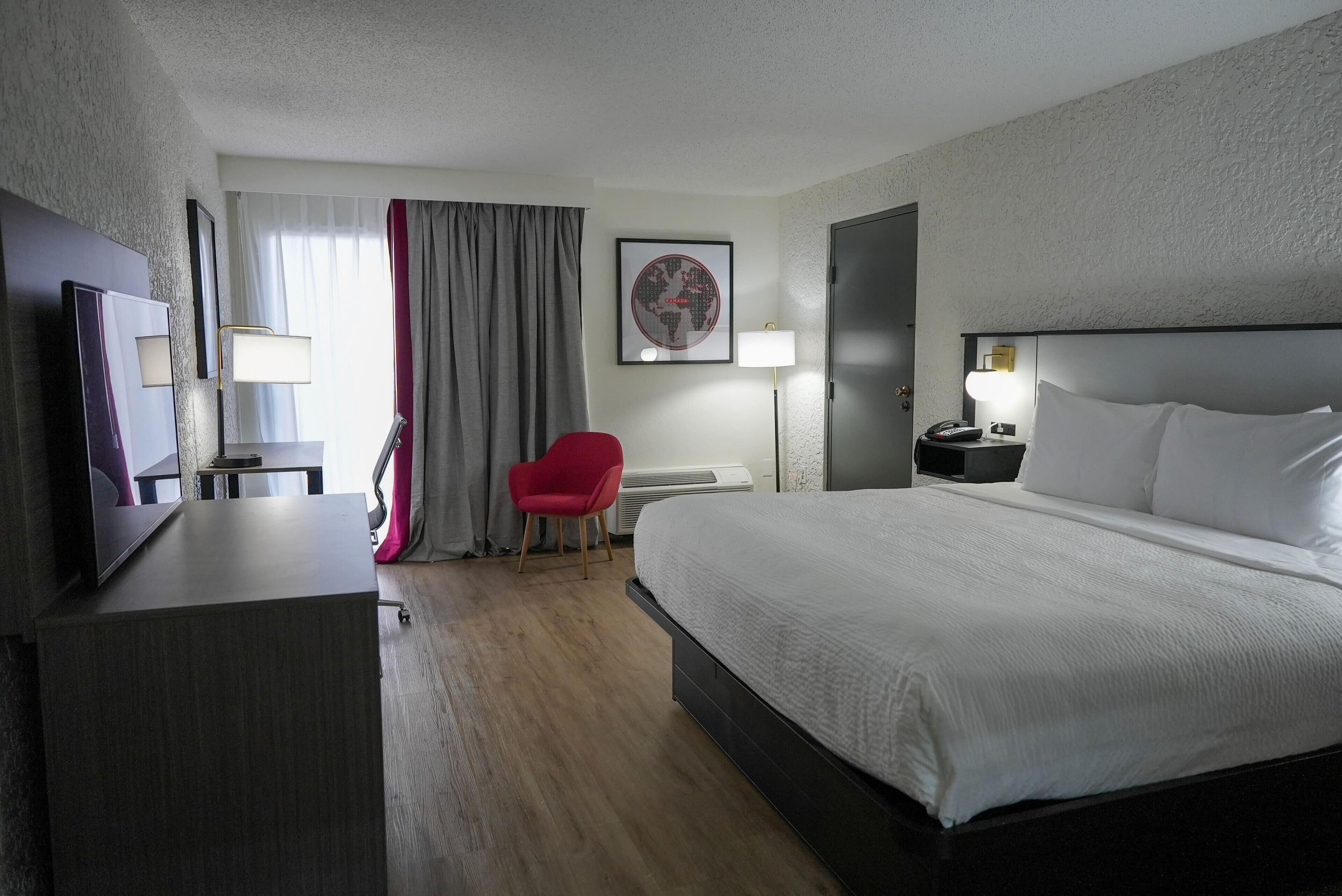 Desk, blackout drapes, iron/ironing board, free cribs/infant beds