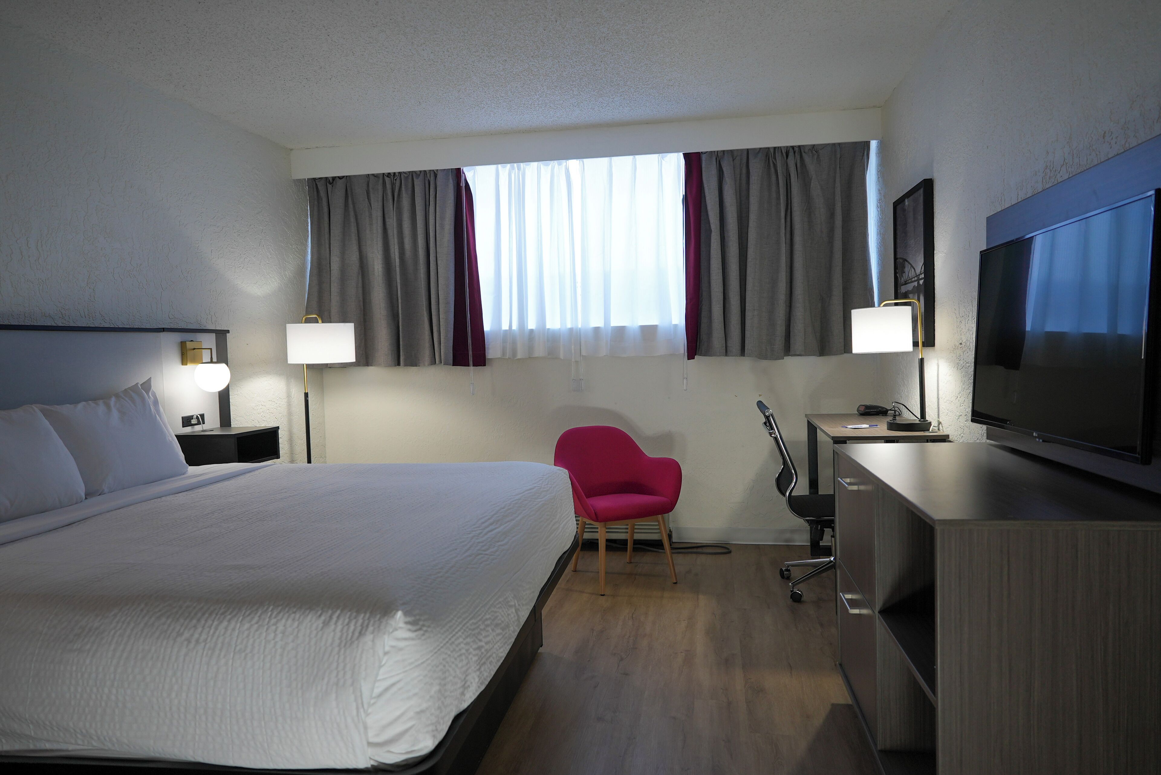 Desk, blackout curtains, iron/ironing board, free cots/infant beds