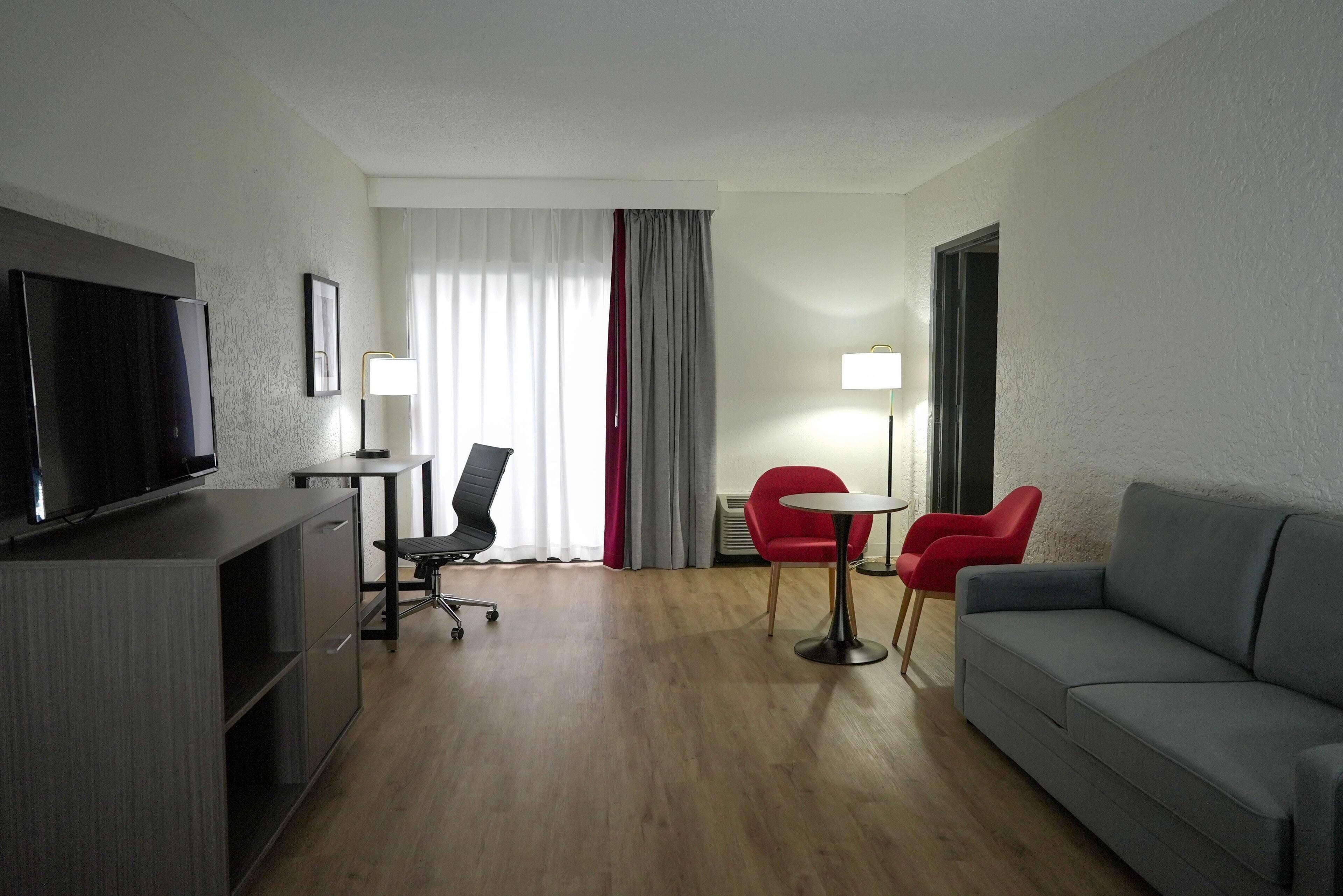 Premium bedding, pillow-top beds, desk, blackout curtains