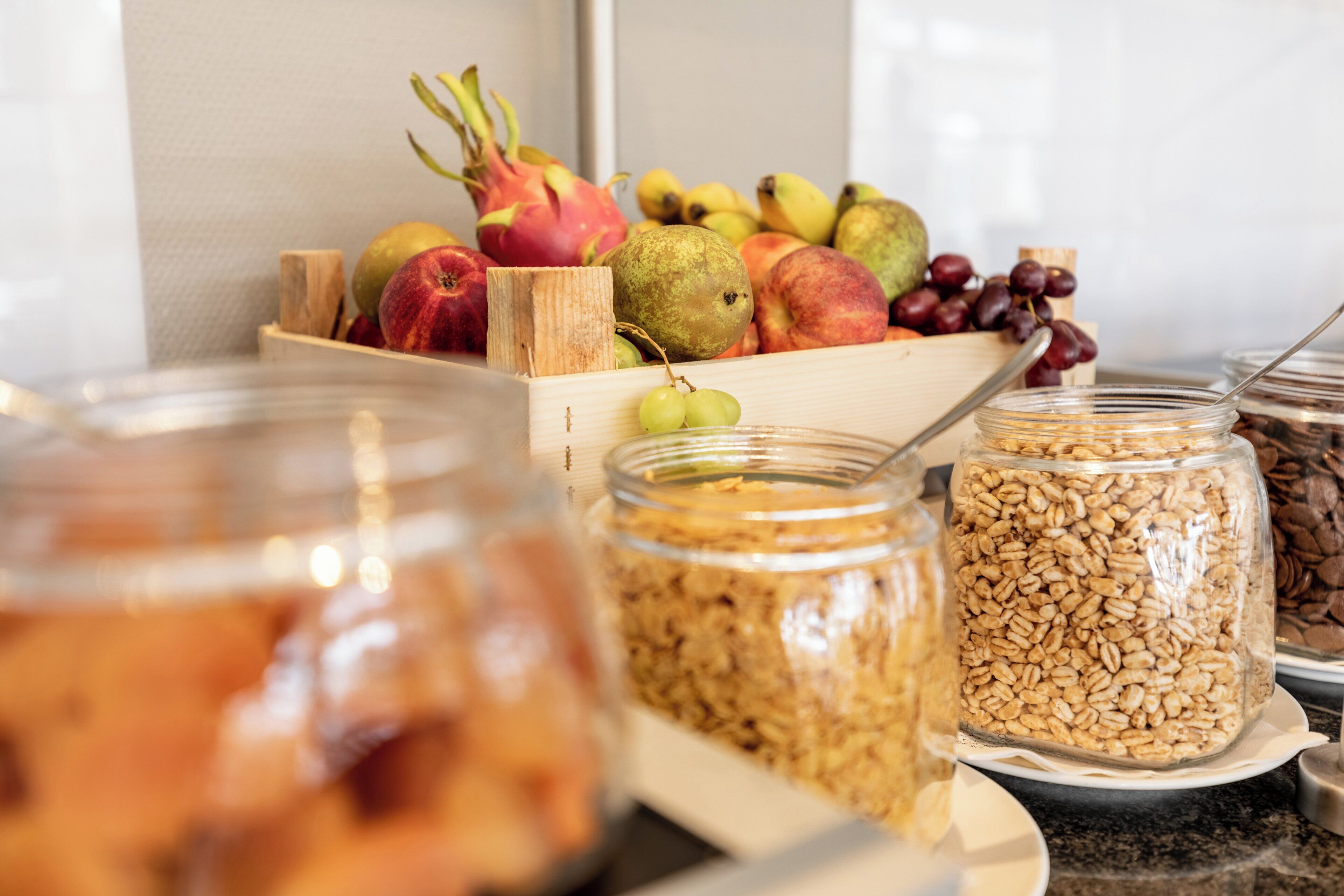 A variety of fruits and grains on a table.