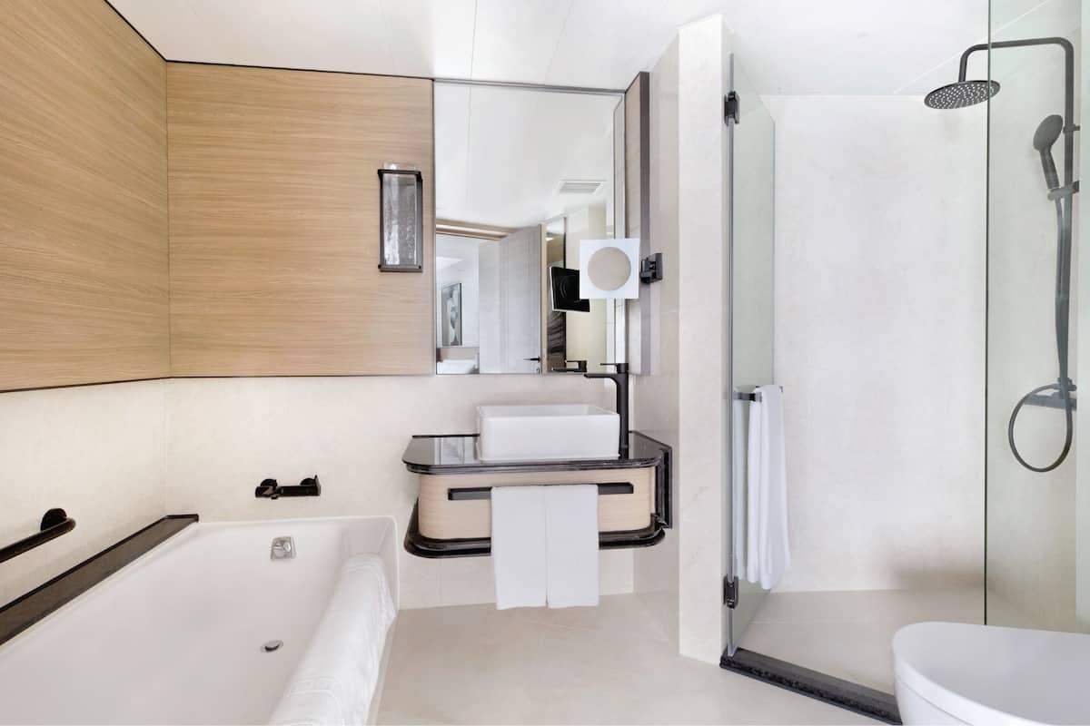 hair dryer, bathrobes, slippers, towels