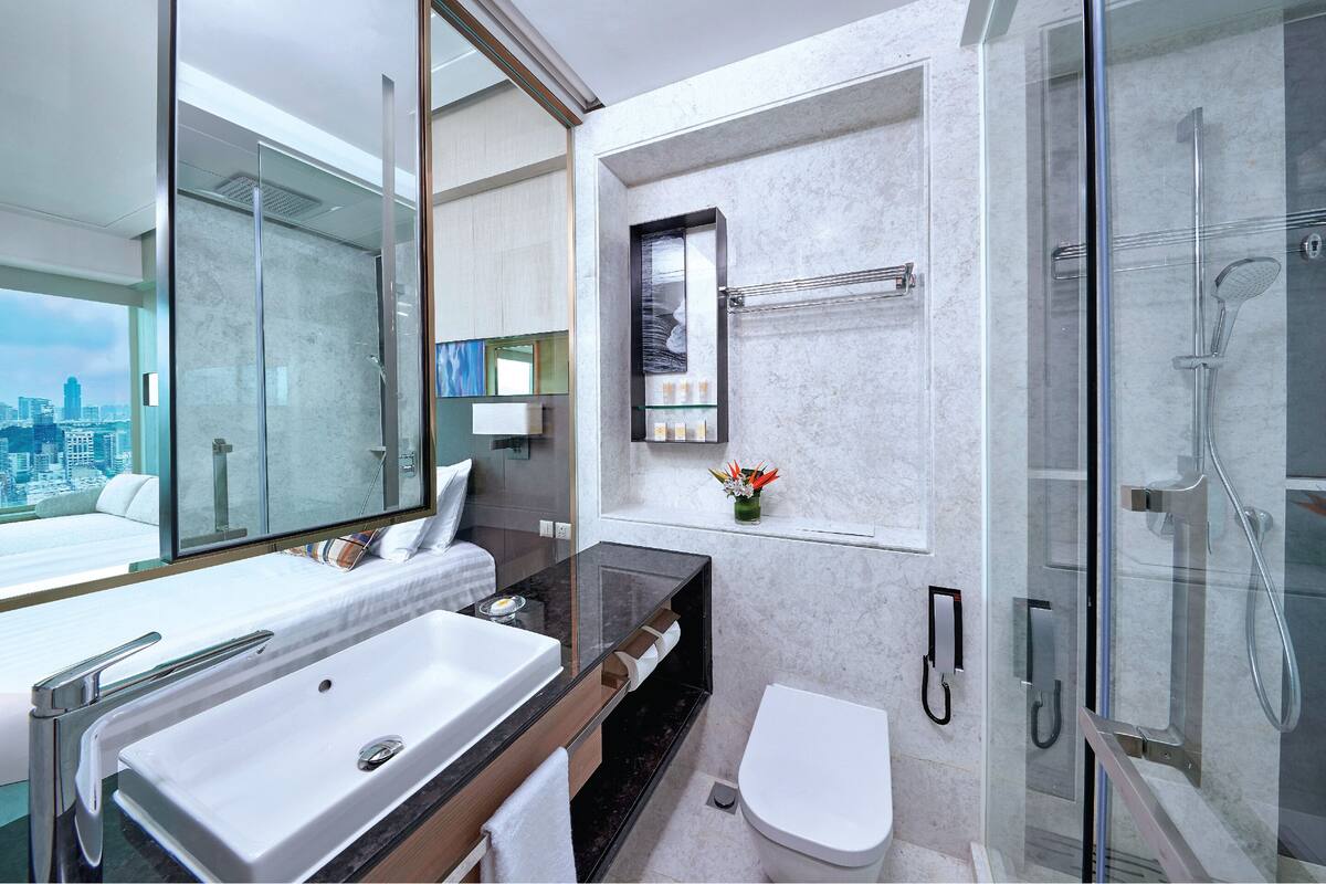 hair dryer, bathrobes, slippers, towels
